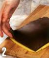 Шоколадное тесто положить поверх смазанного белком песочного теста.