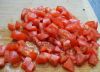 Добавьте помидор (мелко порезанный или натёртый на тёрке) и потушите 5 мин.