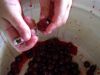 Удалить косточки из ягод. 
Примечание: начинать процесс приготовления настойки надо не размораживая ягод — так они лучше отдают сок.